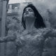 Sofia Boutella with her arms outstretched in costume as Ahmanet the Mummy.